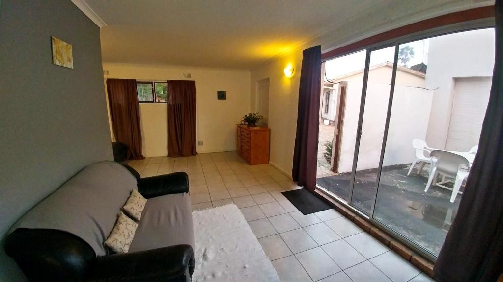 Comfortable lounge opening onto a private patio
