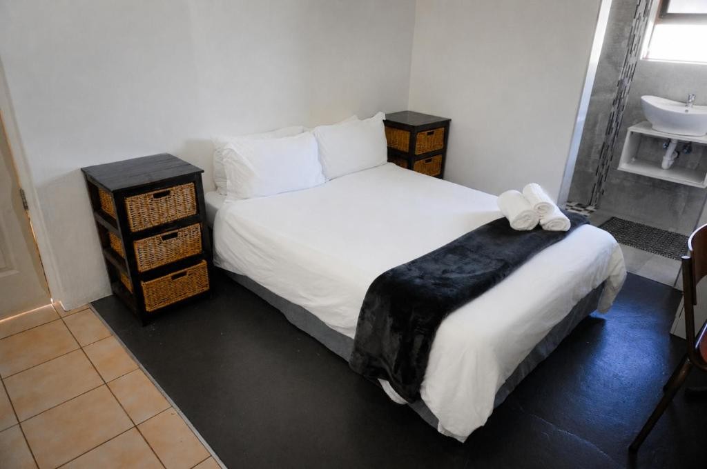 Guest bedroom with a comfortable double bed and en-suite bathroom